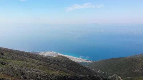 Aerial View From Llogara Pass to Albanian Riviera Beach Clouds and Ionian Sea Coastline
