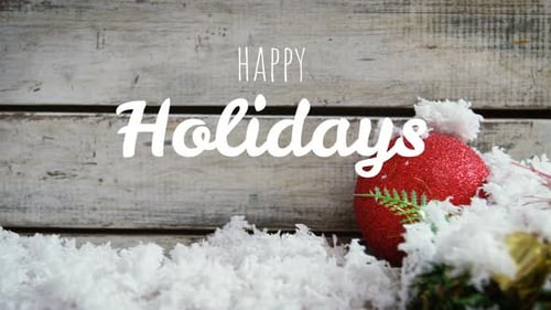 Happy Holidays Greeting with Falling Snow and Christmas Decorations