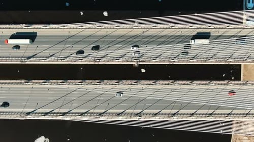 Epic Flight on Drone Along Cable-stayed Bridge, Car Traffic Moves Over Bridge, Aerial View