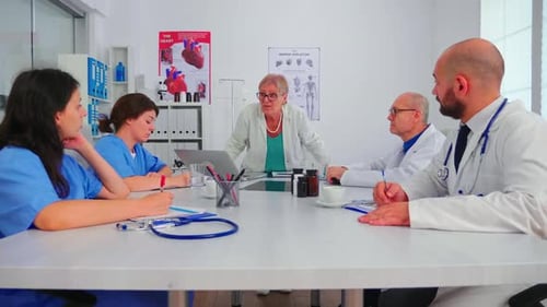 Medical Team Collaboration Meeting in Office