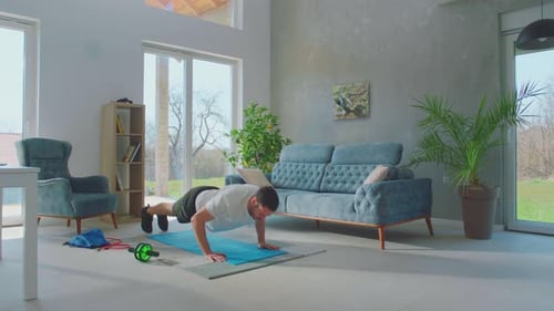 Young man doing push up exercise