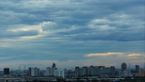 Cityscape View Under a Cloudy Sky