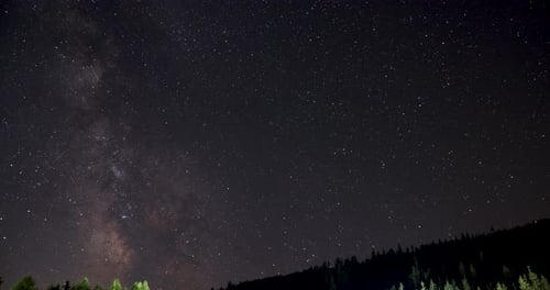 Bright Stars At The Night Sky Over The Mountains