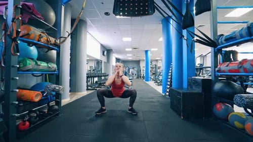 Sporty Woman Exercising in Gym