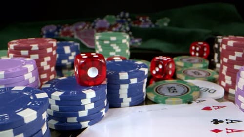 Poker Chips, Dice, and Cards on Table