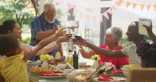 Multi-generation African American family spending time in garden