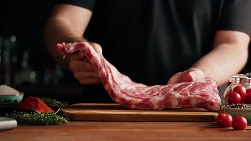 Man Chef Cooking Ribs Closeup