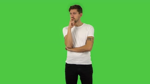 Confident Guy Is Thinking About Something, and Then an Idea Coming To Him. Green Screen
