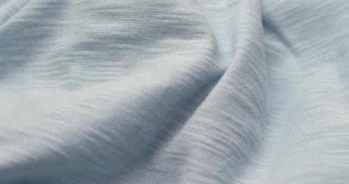 Close Up of Flowing Light Blue Fabric