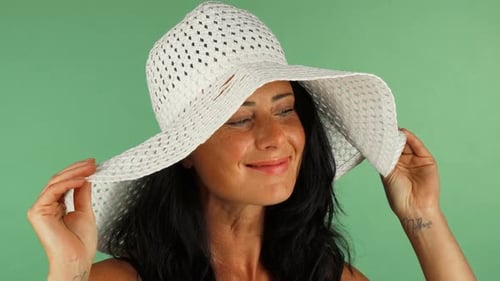 Woman in White Sun Hat Posing