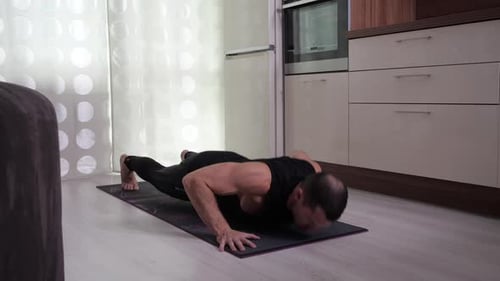 Man Doing Pushups at Home