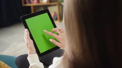 Woman Using Gadget Tablet with Green Screen