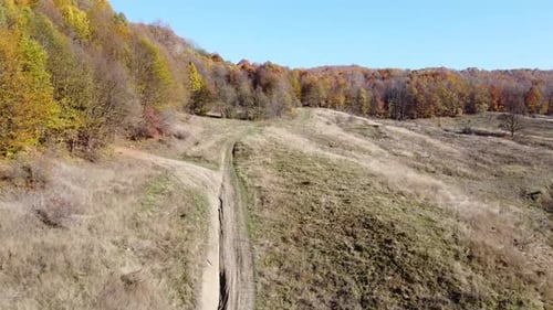 Aerial view of hills on autumn season. Fall colors of a forest in Autumn Season