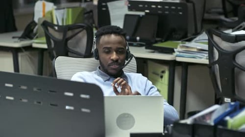 Relaxed Technical Support Agent Talking with Client