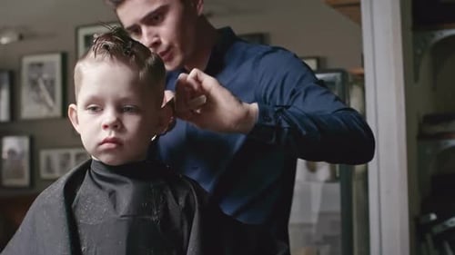 Child Getting Haircut at Home Indoors