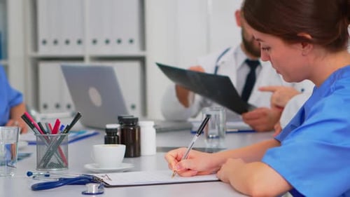 Medical Team Meeting in Bright Office