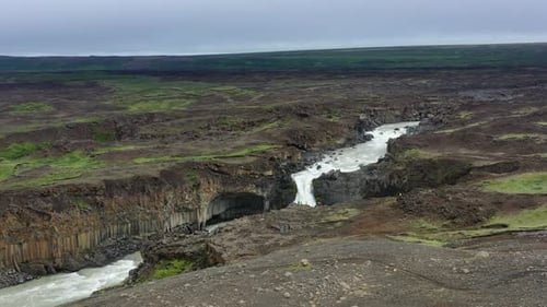 Iceland. View on river and waterfall in canyon from drone. Landscape in Iceland at day time.