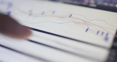 Stock market analysis on digital tablet computer