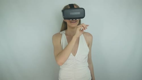 Woman Experiencing Immersive Virtual Reality Headset Technology