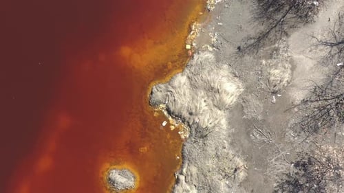 Red waters from acid mine drainage 4K drone video