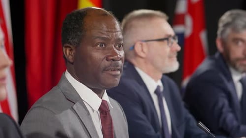 People At A Corporate Event With Flags