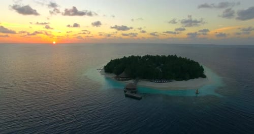 Aerial drone view of scenic tropical islands at sunset in the Maldives