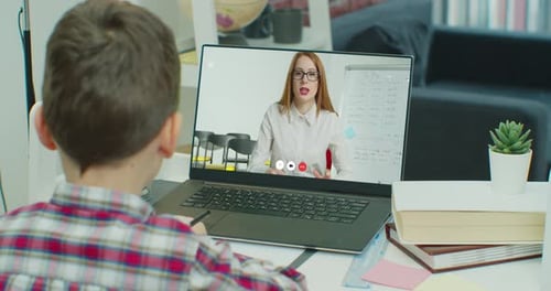 Child Little School Boy Kid Schoolboy Children Using Tablet Laptop Computer for Homework at Home