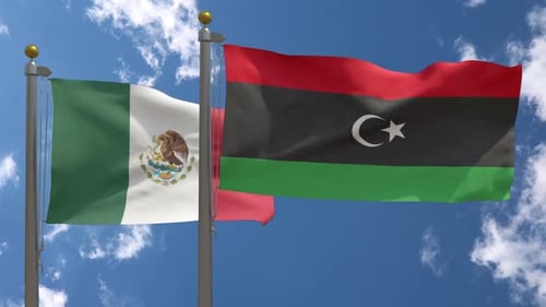 Waving National Flags of Mexico and Libya