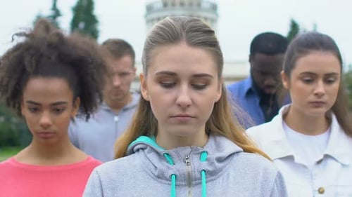 Group of Young Adults Standing in Park