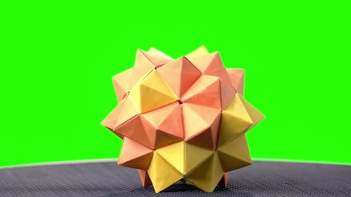 Modular Origami Ball on Green Screen.