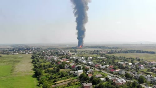 Aerial View of Huge Fire View From Quadcopter. Black Smoke Rises High Into the Sky. Fire on the