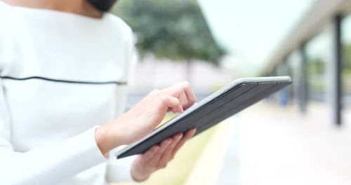 Woman working on tablet computer