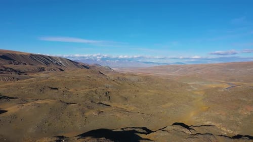 Mountains and Hills on Sunny Evening. Aerial View. The Altai Mountains, Russia