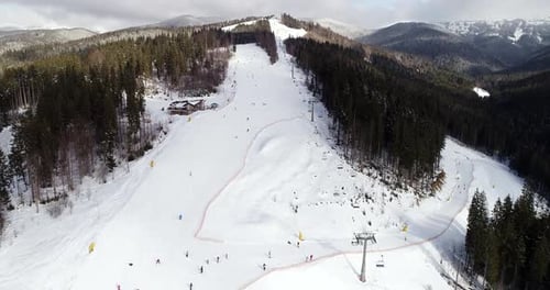 Aerial View of the Ski Resort in Mountains at Winter