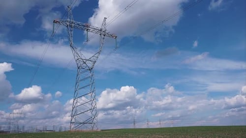 Timelapse High voltage electricity tower and power lines