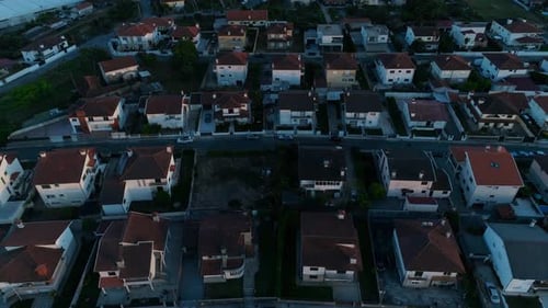 Aerial View of Residential Houses in Suburban Rural Area at Sunset