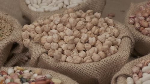 Variety of Beans and Legumes in Burlap Sacks