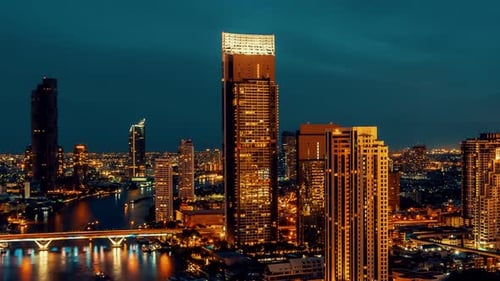 Time Lapse Night Cityscape and Highrise Buildings in Metropolis City Center