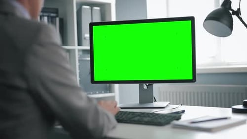 Woman with Green Screen Laptop