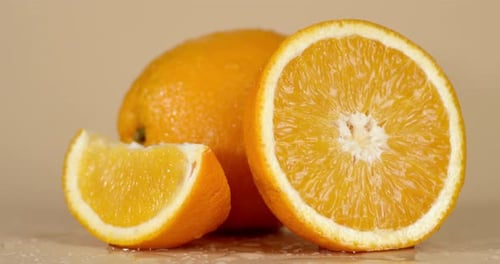 Close Up Shot of Orange Fruit and Slices