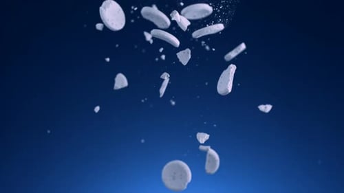 Abstract White Fragments Falling on Blue Background