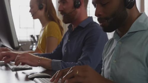 Young creative professionals working in a modern office