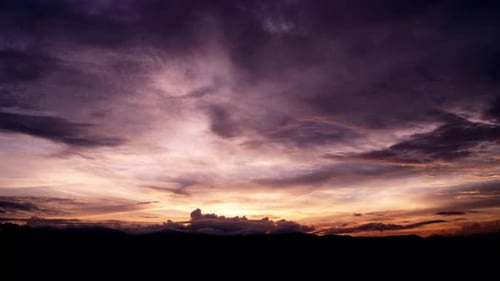 Dramatic Cumulus tropical cinematic cloudscape building up over the mountain turning into a tropical