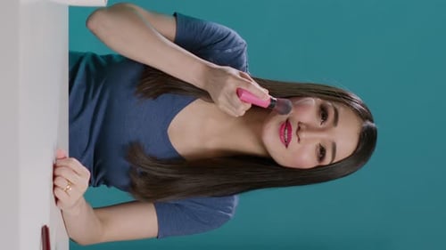 Vertical Video Beauty Influencer Recording Makeup Tutorial Video on Camera