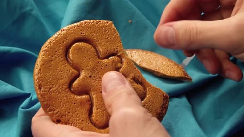 Breaking Apart a Dalgona Cookie