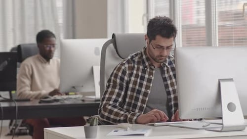 Male Programmers Team Working in Office