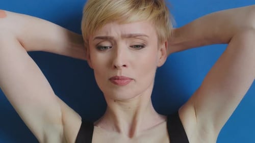 Top View Female Portrait of Caucasian Mature Middleaged Lady Blonde Muscular Athletic Woman with