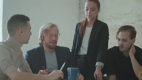 Young Professionals Collaborating in a Modern Workplace