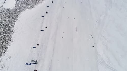 Skiers And Ski Piste