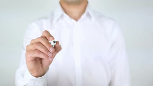 Man Writes "Happy" on a Clear Surface